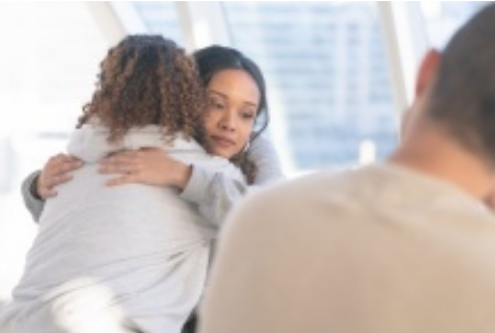 mother comforting sad child