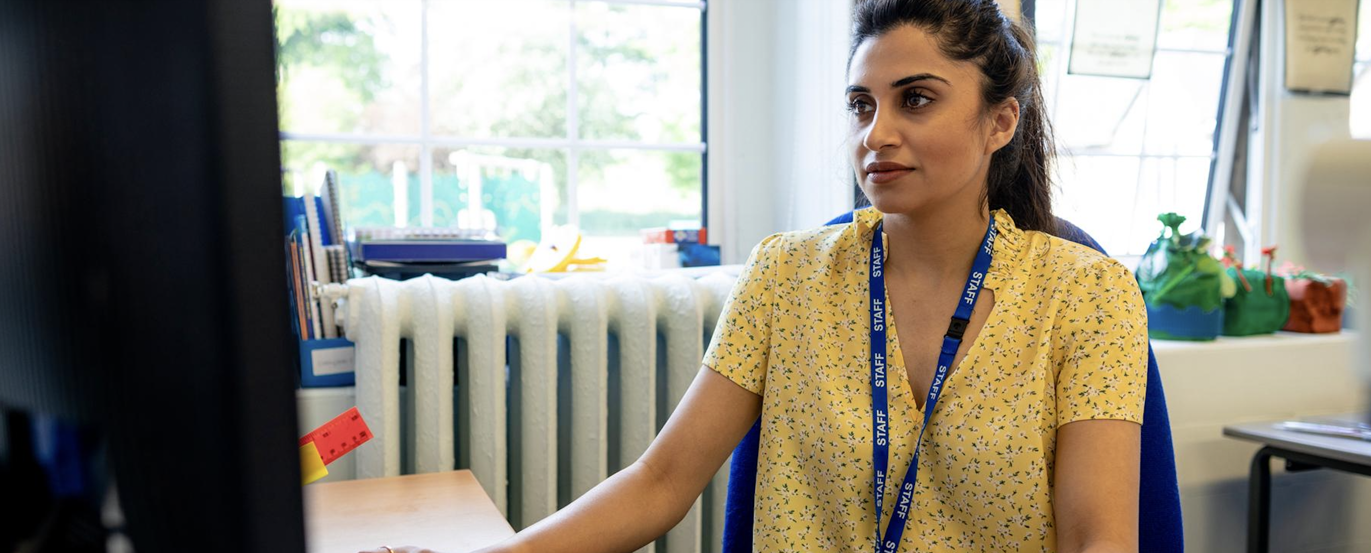Teacher at desk