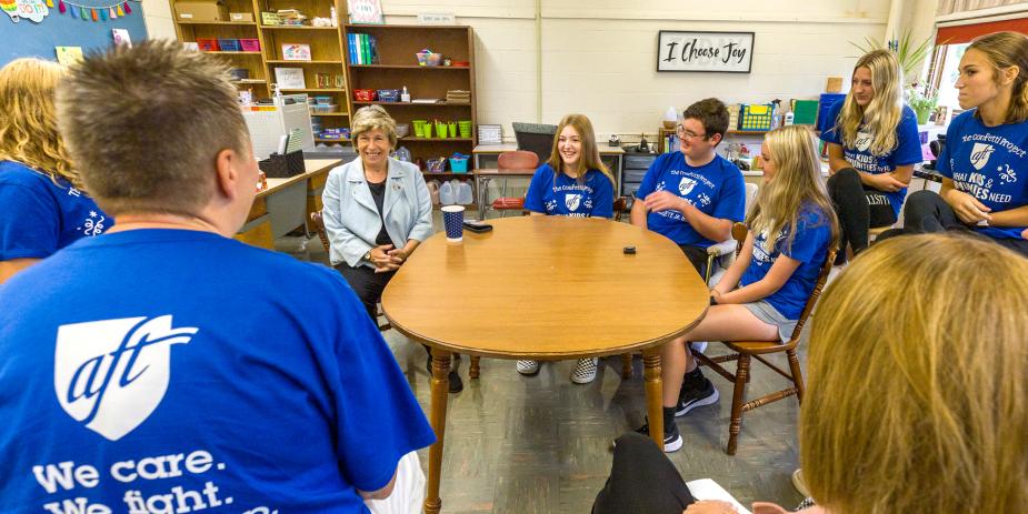 randi weingarten talking to students in a classroom