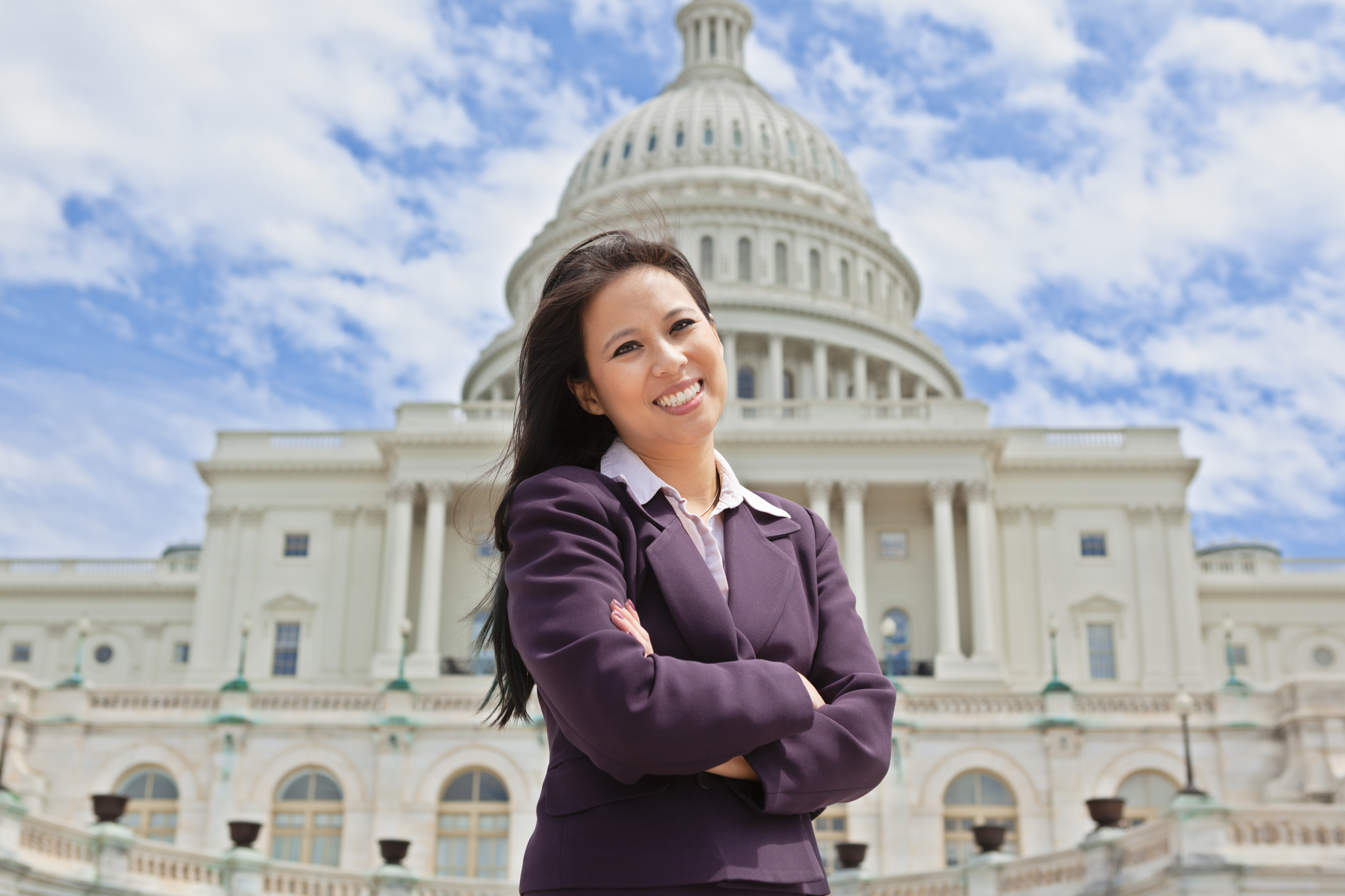 Teacher in front of the capitol
