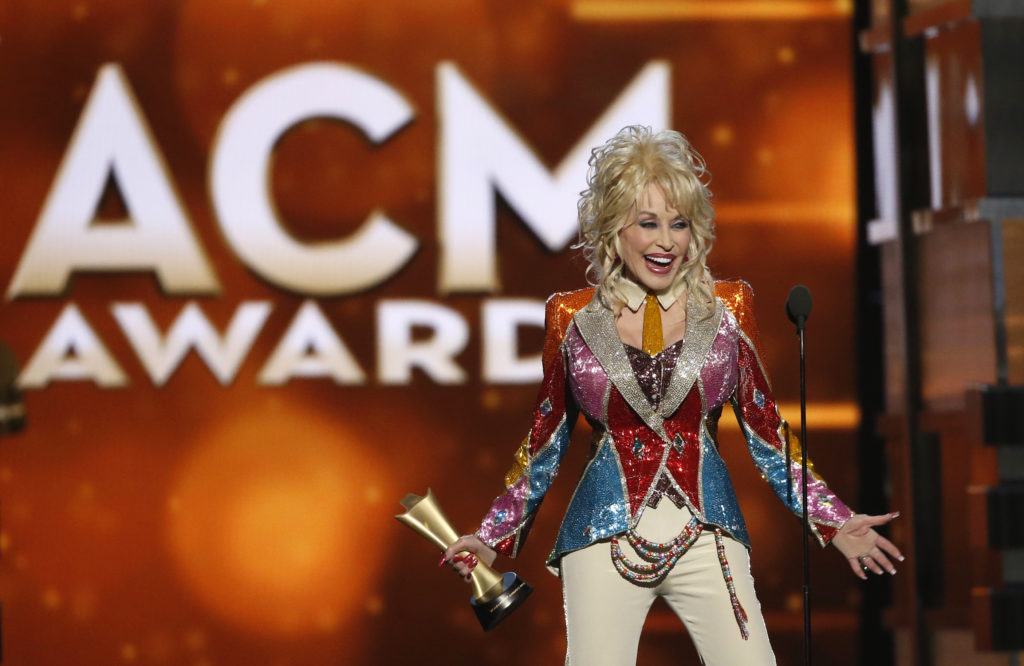 Dolly Parton accepts the Tex Ritter Award during the 51st Academy of Country Music Awards in Las Vegas, Nevada April 3, 2016. REUTERS/Mario Anzuoni