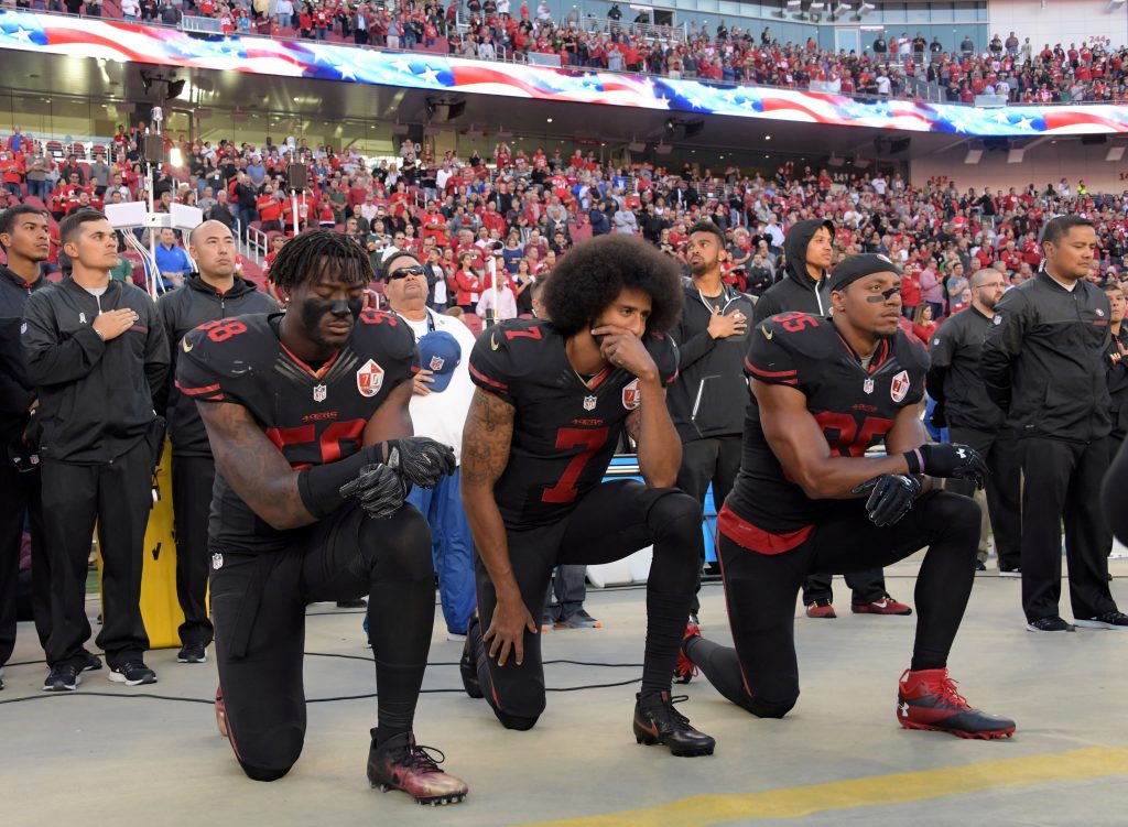 NFL Players kneeling