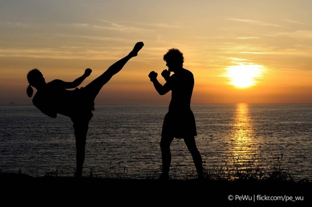 Image of kickboxers at sunset.